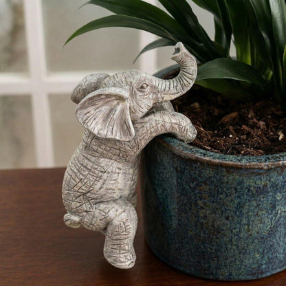 Elefant Figur am Blumentopf als stilvolle Pflanzen Dekoration im Wohnbereich