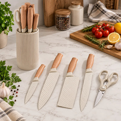 Übersicht des Küchenmesser-Sets mit vier Messern, Küchenschere und beige geripptem Messerhalter.